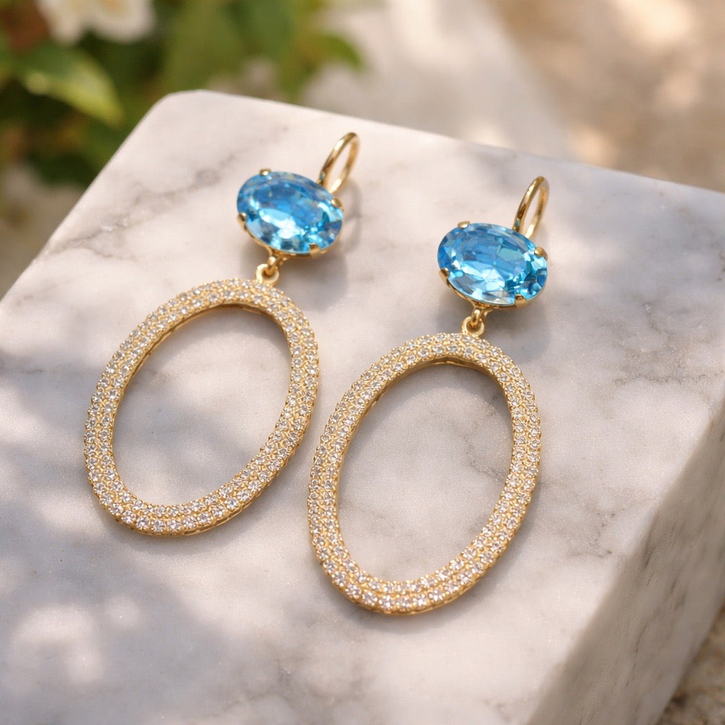 Belluno Crystal Bleu statement oorbellen met blauwe Swarovski kristal en gouden ovale ring - DAMICE Jewelry