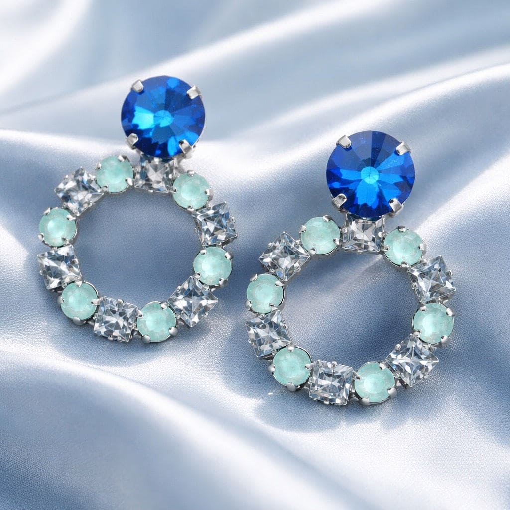 Bloom Bleu Silver oorbellen met blauwe en mintgroene Swarovski kristallen in zilveren cirkel design