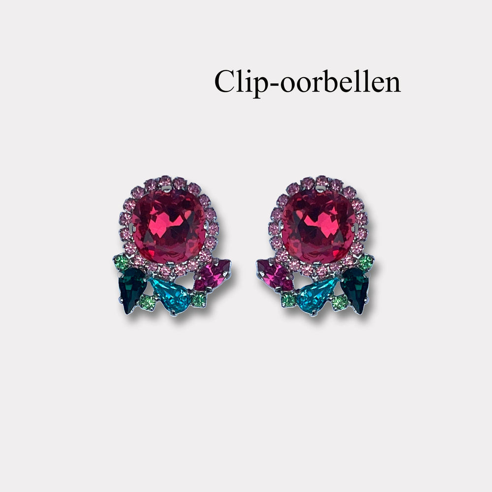 Ben jij op zoek naar oorbellen maar je hebt geen gaatjes, steel dan de show met deze clip-oorbellen van Farfino. Handgemaakt in Italië en ingelegd met prachtige kristallen van het merk Swarovski.