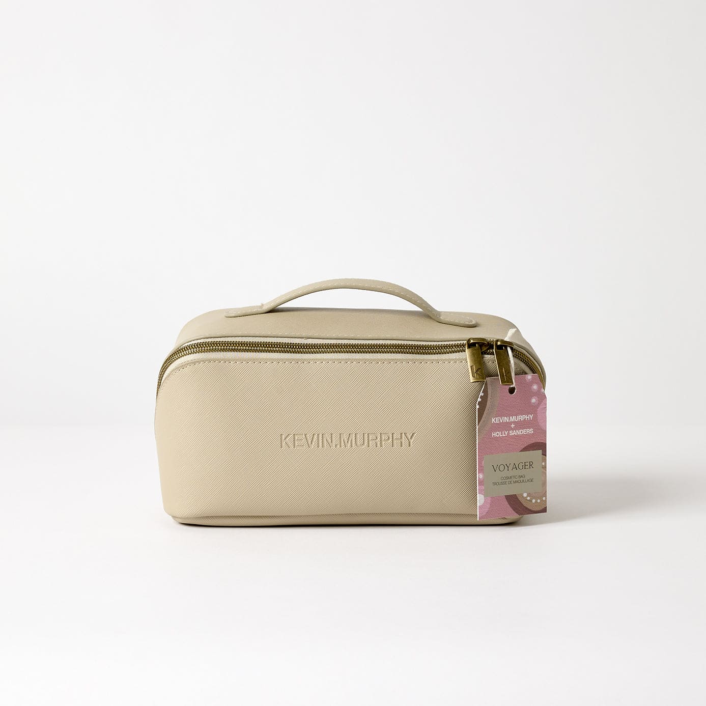 Kevin Murphy toilettas in champagne beige kleur met goudkleurige ritssluiting en handvat, luxe cosmeticatas voor haarverzorgingsproducten