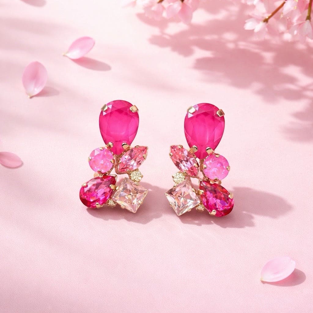 Luxe roze kristallen oorstekers met 7 kristallen in verschillende roze tinten, goudvergulde nikkelvrije en hypoallergene statement oorbellen voor dames
