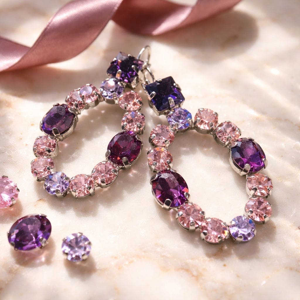 Romagna purple silver , val op met deze oorhangers. niche oorbellen ingelegd met paarse swarovski. maak jou outfit uniek en straal met prachtige oorbellen